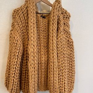 NEW without tags. Cable knit oversized sweater. Size medium/large.